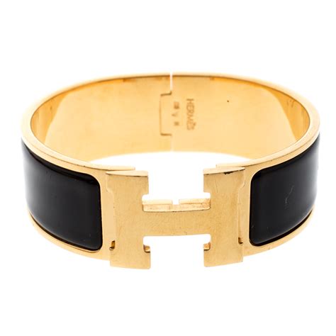 hermes clic clac black and gold|authentic Hermes clic clac bracelet.